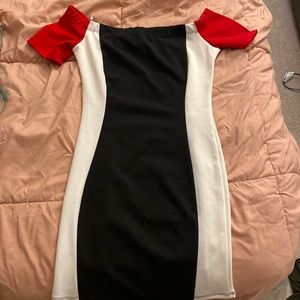 Mocking Jay brand cocktail dress, black, white, & red off the shoulder sleeves.